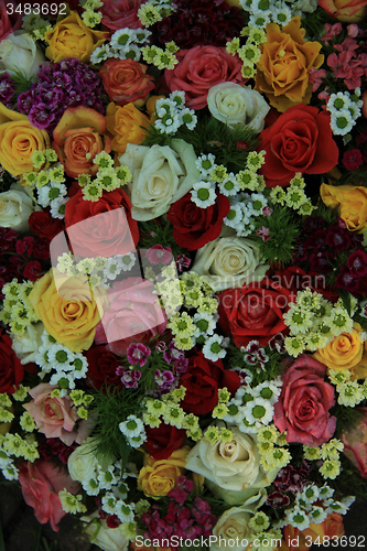 Image of Mixed colorful wedding flower arrangement