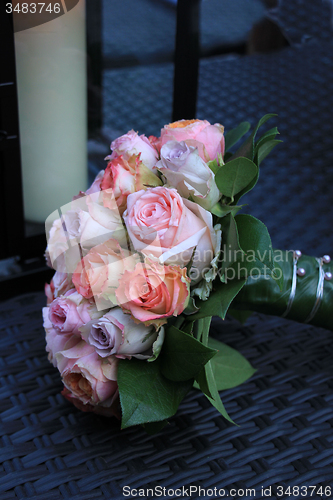 Image of Pastel roses in bridal bouquet