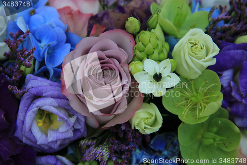 Image of Blue and purple bridal bouquet