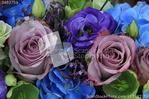 Image of Blue and purple bridal bouquet