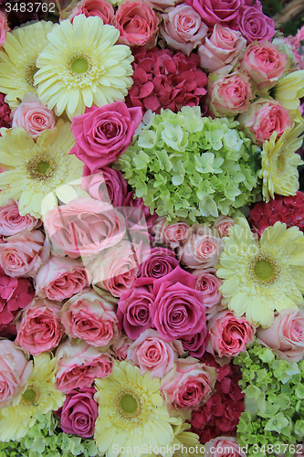 Image of Yellow and pink bridal flowers