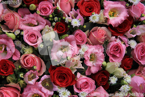 Image of Red, pink and white wedding arrangement