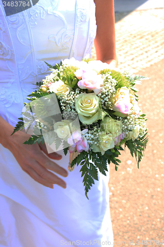 Image of Bride holding bouquet