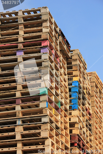 Image of Stacked wooden pallets