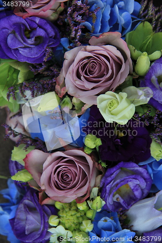 Image of Blue and purple bridal bouquet