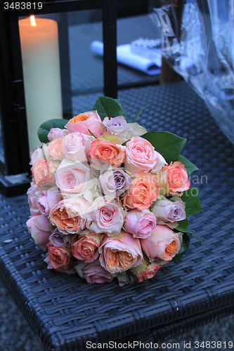 Image of Pastel roses in bridal bouquet