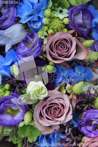 Image of Blue and purple bridal bouquet