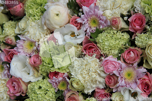 Image of Pink, green and white bridal arrangement