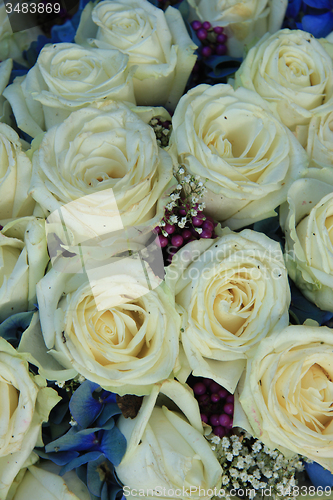 Image of White and blue bridal arrangement