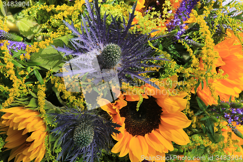 Image of Blue and yellow Sunflower arrangement, Wedding decorations