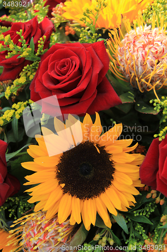 Image of Sunflowers and roses