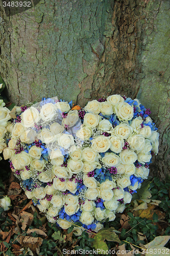 Image of Heart shaped sympathy flowers