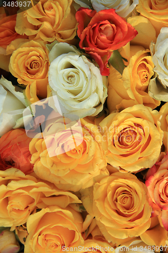 Image of yellow and white rose wedding arrangement