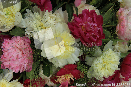 Image of Yellow/white and pink peony wedding arrangement