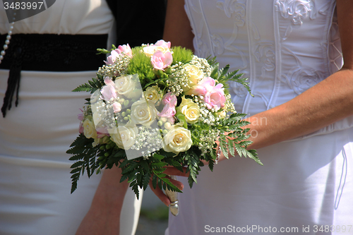 Image of Bride holding bouquet