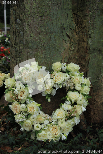 Image of Heart shaped sympathy flowers