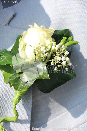 Image of Groom wearing boutonniere