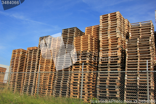 Image of Stacked wooden pallets