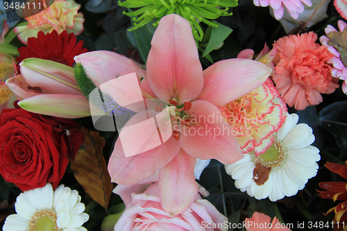 Image of Lilies and roses in bridal flowers