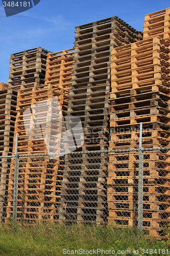 Image of Stacked wooden pallets