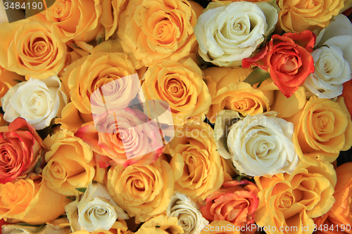 Image of yellow and white rose wedding arrangement