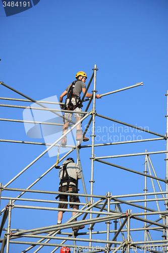 Image of Construction worker on scaffolding