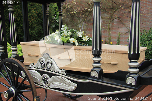 Image of Casket on a funeral carriage