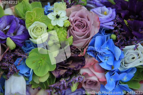 Image of Blue and purple bridal bouquet