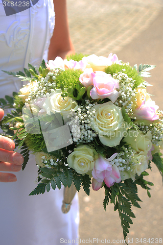 Image of Bride holding bouquet