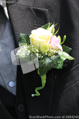 Image of Groom wearing boutonniere