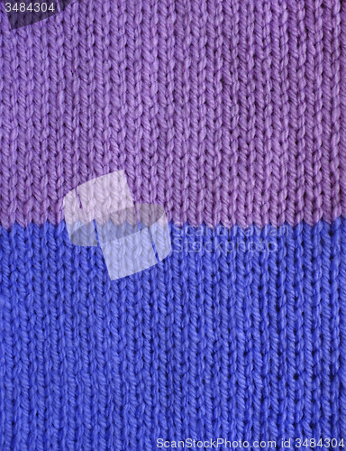 Image of Purple and blue striped stockinette knitting 