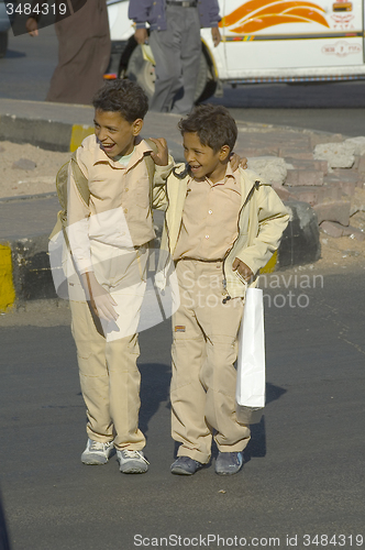 Image of Pupils come back home from school