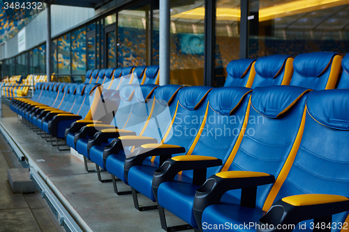 Image of blue chair on sport stadium