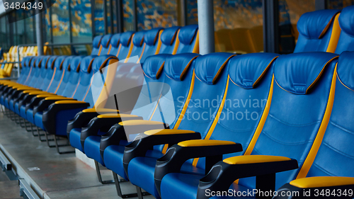 Image of blue chair on sport stadium