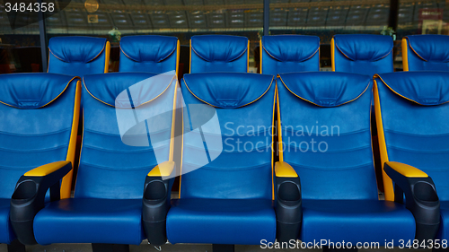 Image of blue chair on sport stadium