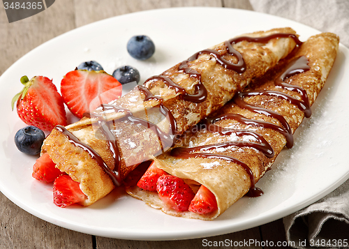 Image of Crepes with strawberries and chocolate