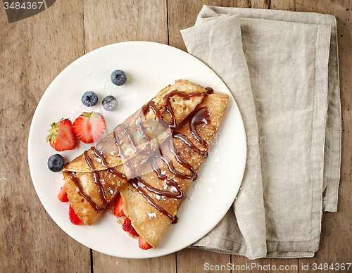 Image of Crepes with strawberries and chocolate