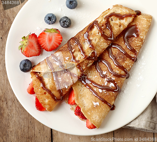 Image of Crepes with strawberries and chocolate