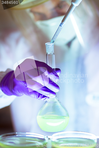 Image of Working in laboratory with high degree of protection.