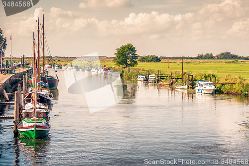 Image of Boats on a river canal