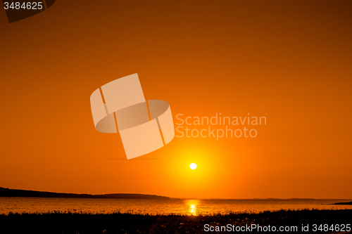 Image of Beautiful sunrise over a lake