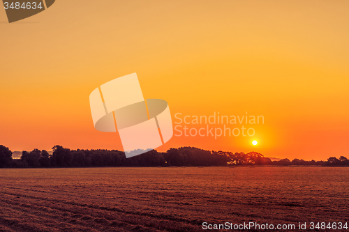 Image of Beautiful sunrise in a countryside landscape