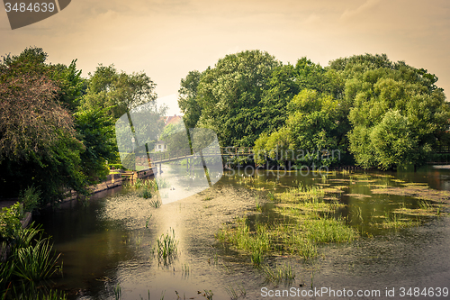 Image of Idyllic lake with a bridge