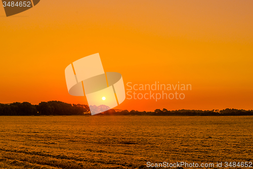 Image of Field landscape with a sunrise