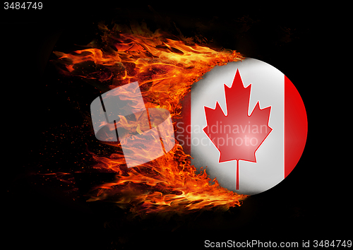 Image of Flag with a trail of fire - Canada