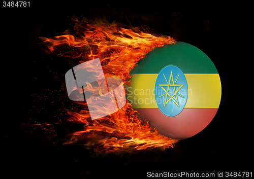 Image of Flag with a trail of fire - Ethiopia