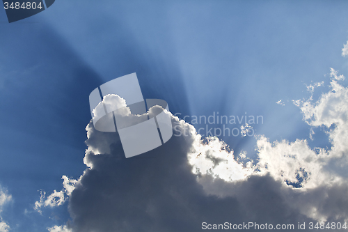 Image of Sun rays through a cloud