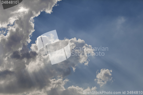 Image of Sun rays through a cloud