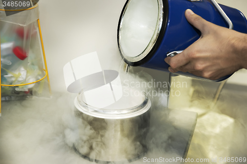 Image of person with liquid nitrogen