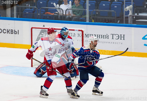 Image of A. Koznev (9) and V. Brezgunov (15) in action